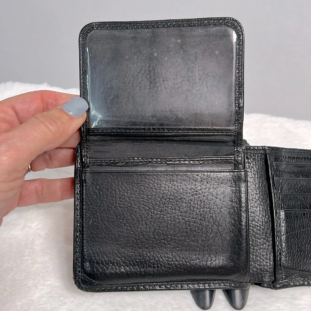 Tumi black leather